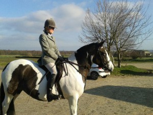 Sue's friend Tracy Robshaw, on board. They were at Kitty's first ever dressage test, that "she took all in her stride".